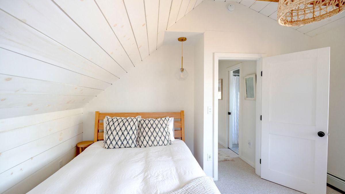 Bed Placed In A White Bedroom
