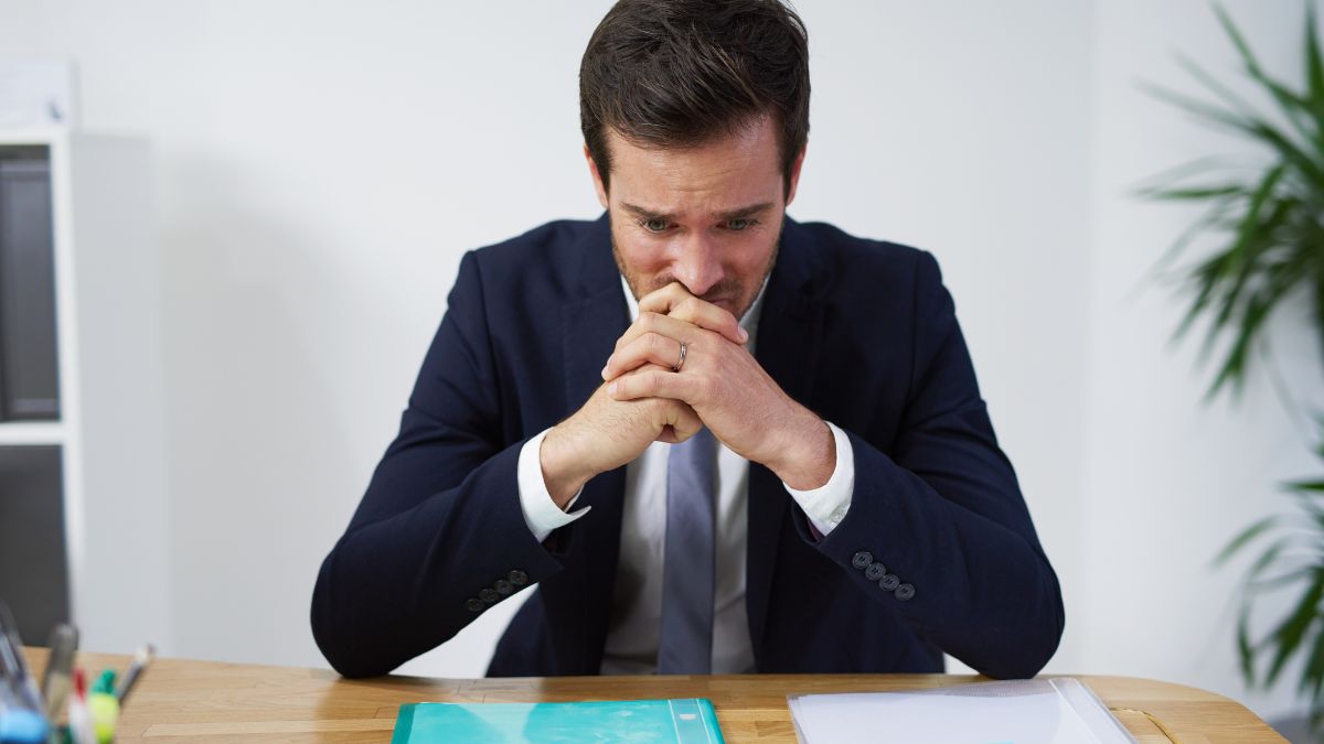 A Person Has Burnout Sitting At A Desk